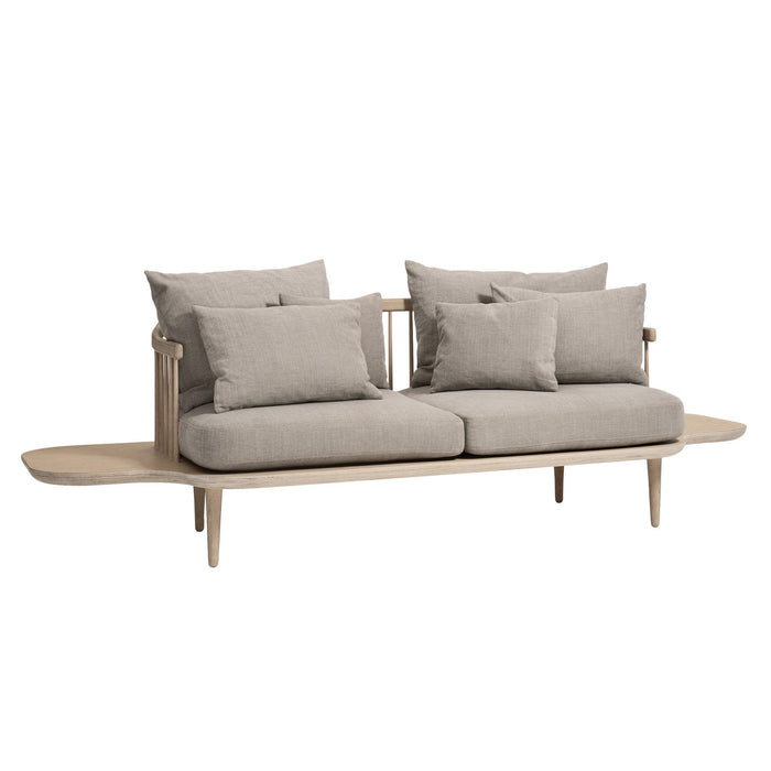Beige fabric sofa with plush grey cushions and a minimalist wooden frame, offering a modern, sleek design.