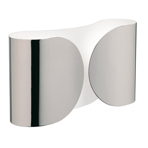 Sleek metallic lamp with a reflective silver finish and smooth, curved design.