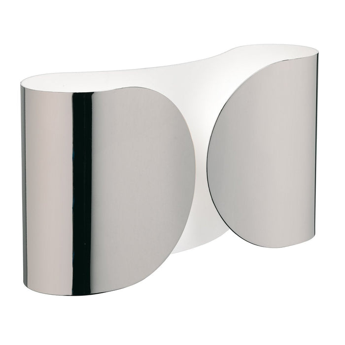 Sleek metallic lamp with a reflective silver finish and smooth, curved design.