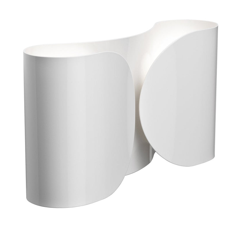 Sleek white lamp with smooth curves and minimalistic design, showcasing a modern aesthetic and elegant simplicity.