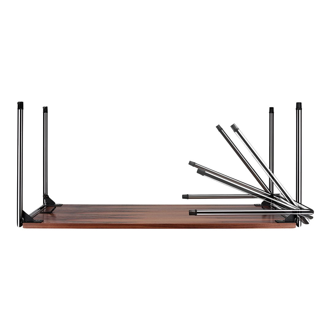 Folding table with a rich wooden surface and sleek black metal legs, showcasing a modern minimalist design.