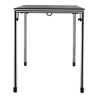 Black tabletop with a sleek chrome frame and straight legs, featuring a modern, minimalist design.