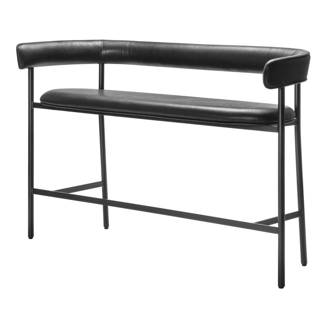 Black leather bench with a sleek curved back and minimalist black metal frame.