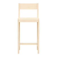 Natural wood color bar stool with a minimalist design and smooth, clean lines. Perfect for modern decor.