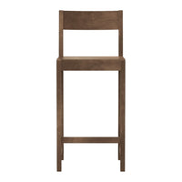 Wooden bar stool in a rich brown color with a simple, clean design and no visible patterns.