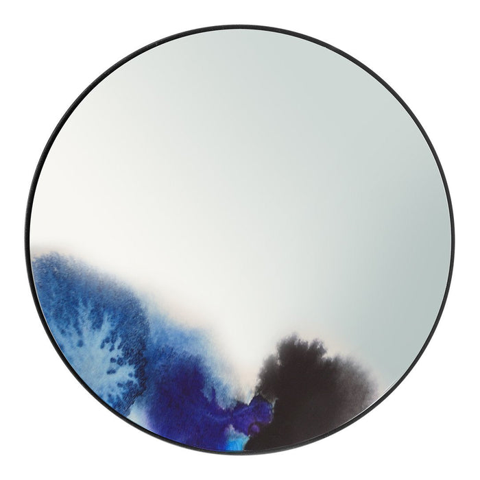 Round mirror with a black border, featuring abstract blue and black watercolor patterns along the edges.
