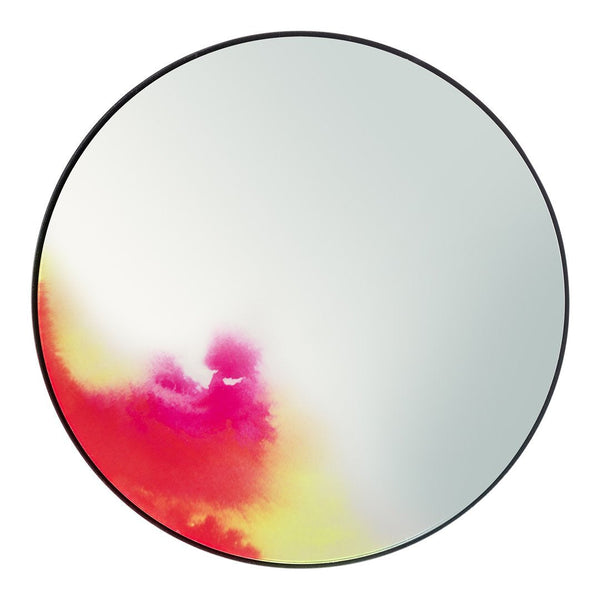 Round mirror featuring a vibrant gradient of pink, yellow, and white hues with a sleek black border.