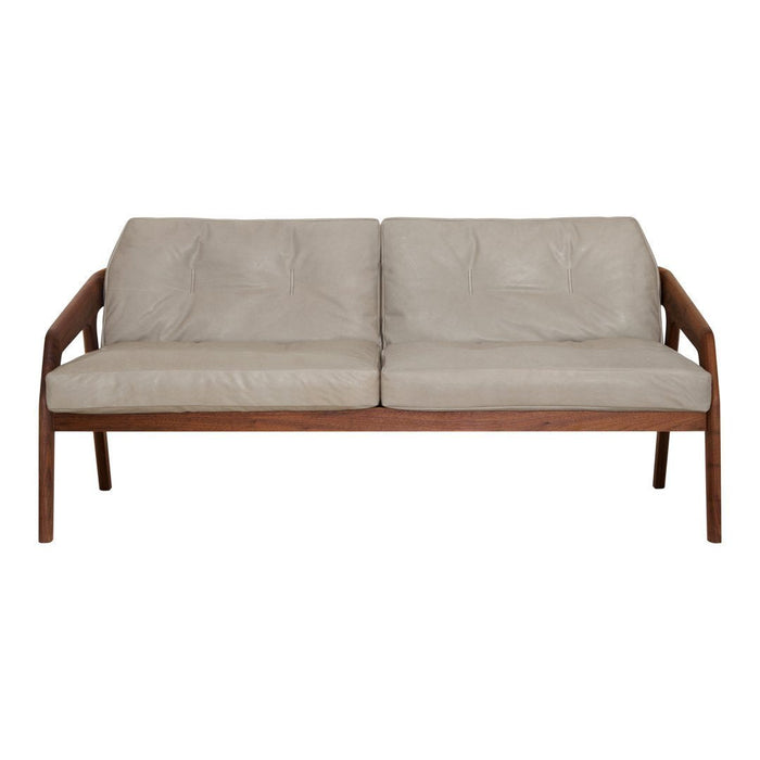 Beige leather sofa with a sleek wood frame, featuring a minimalist design and padded cushions, perfect for modern decor.