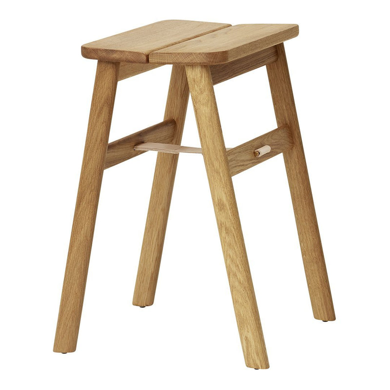 Natural wood stool with a light oak finish and smooth, simple lines. Ideal for modern decor.