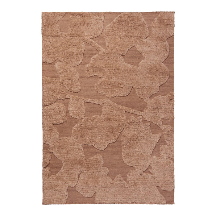 Beige area rug with subtle floral pattern in varying shades of tan and brown. Soft textured surface for cozy comfort.