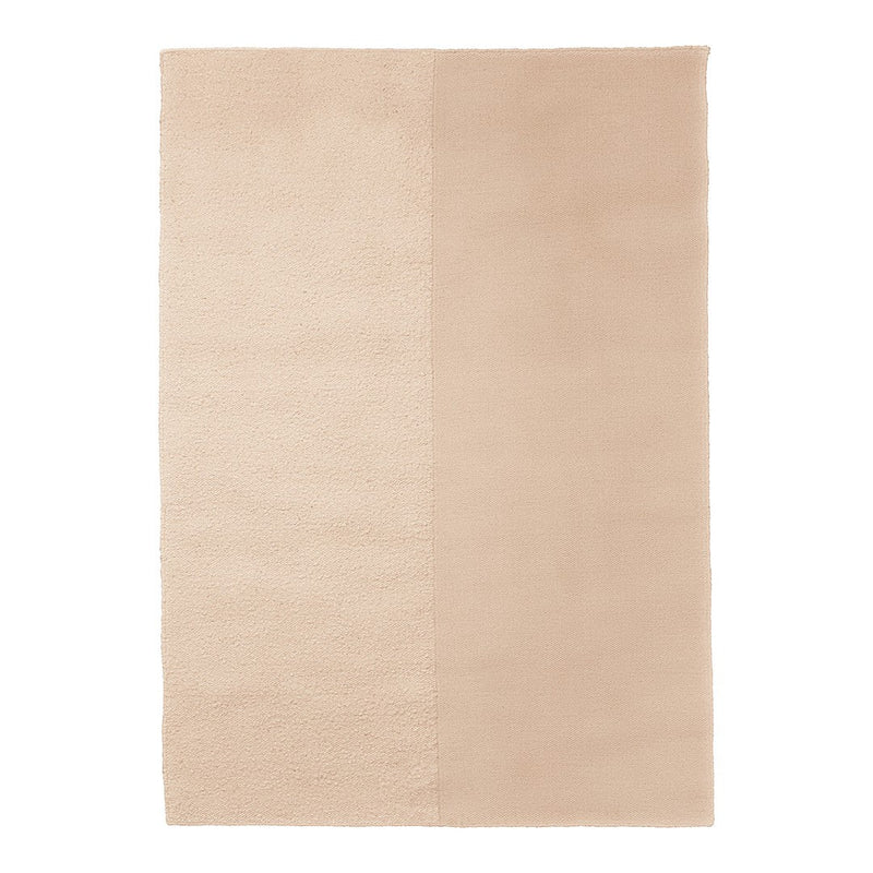Beige area rug with textured and smooth patterns, showcasing a harmonious blend of light neutral tones.