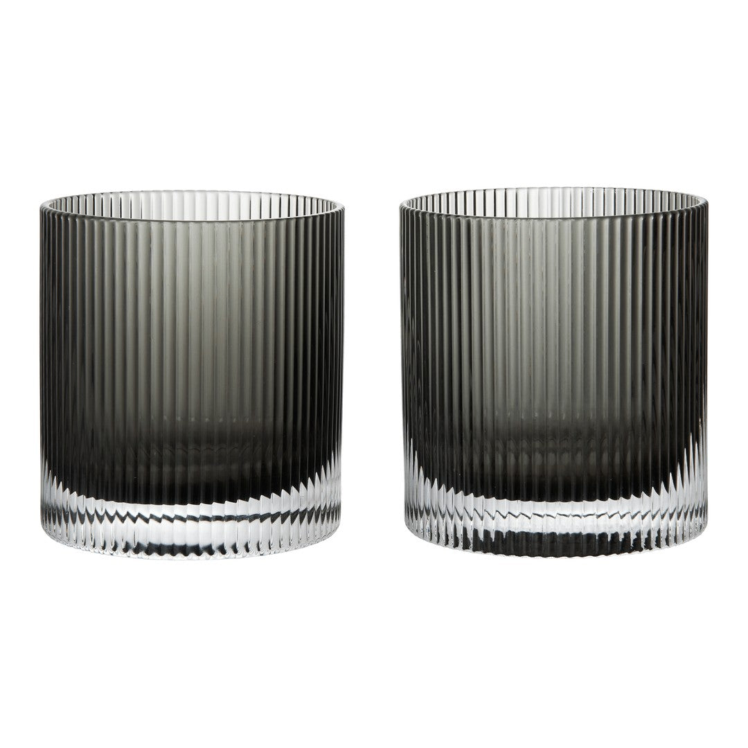 Set of two glass cups in smoky gray with elegant vertical ribbed patterns and clear bases.