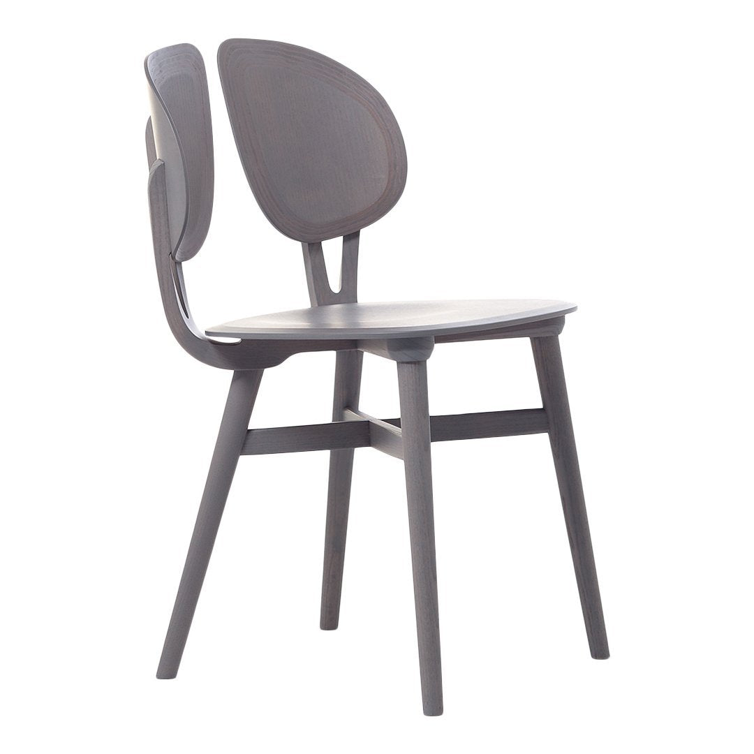 Dark gray chair with a minimalist design, featuring smooth curves and a subtle matte finish. Ideal for modern spaces.