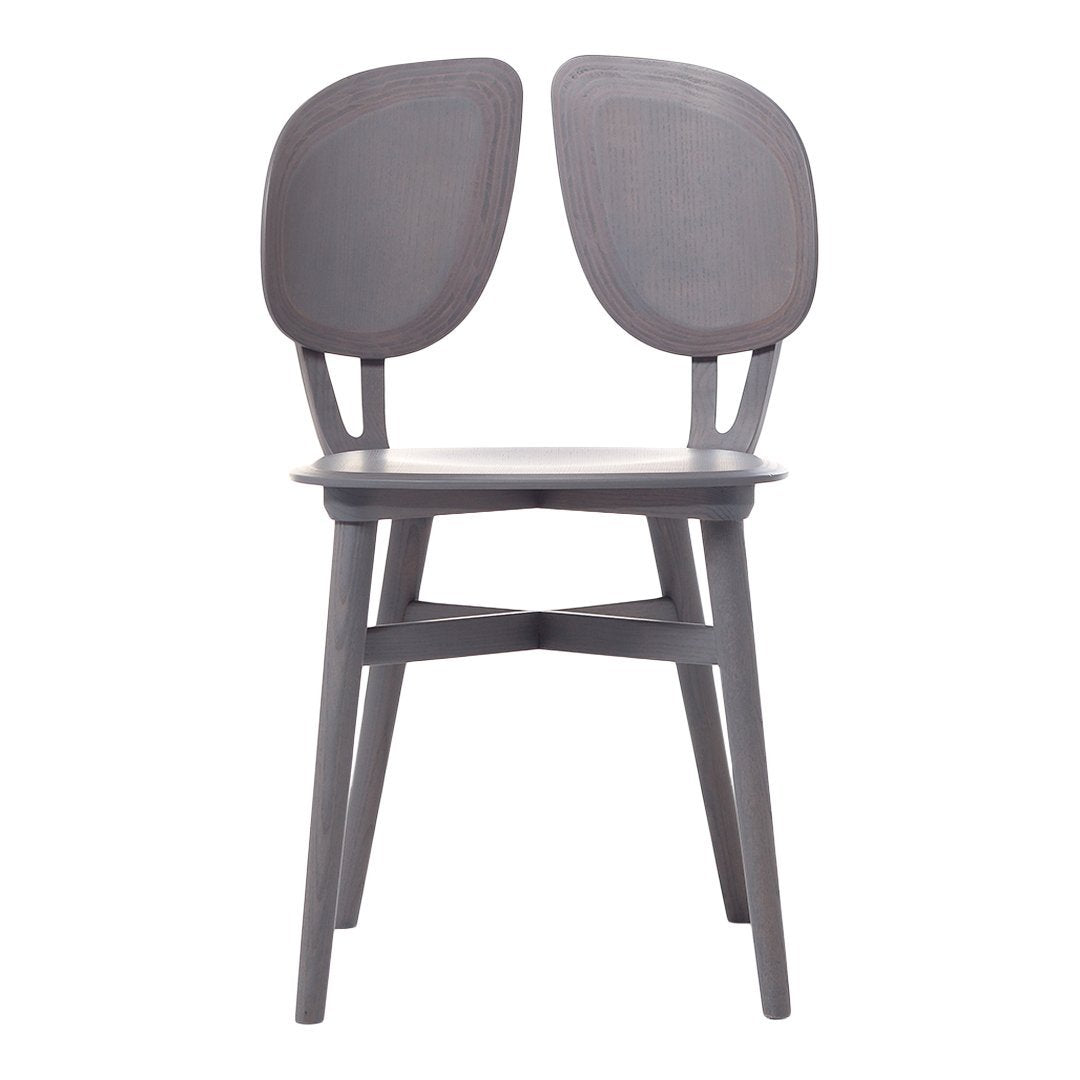 Modern grey chair with smooth, minimalist design and a sleek finish. Perfect for contemporary decor.