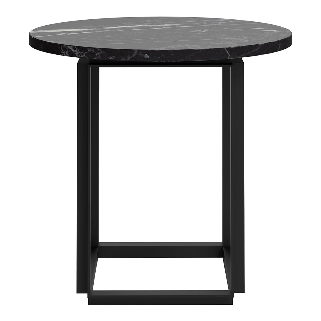 Round black marble side table with a sleek black metal frame, showcasing a modern and elegant design.
