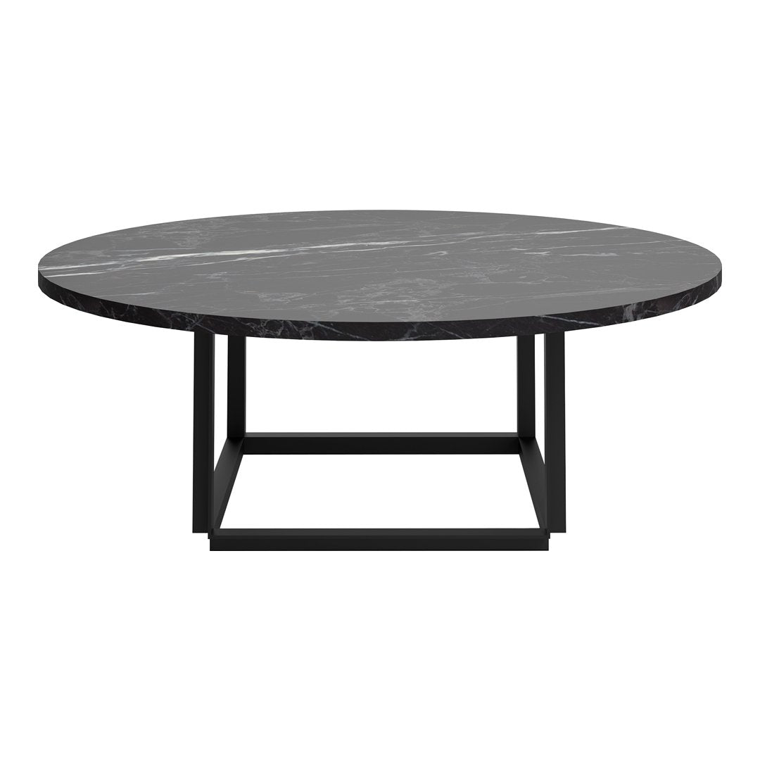 Round black marble coffee table with subtle white veining, supported by a sleek black metal frame.