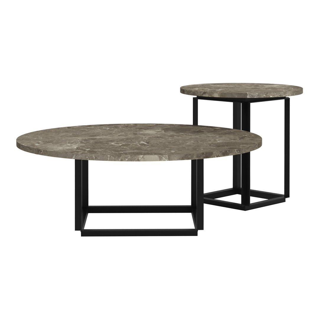 Set of round coffee tables featuring textured gray stone tops and sleek black metal bases. Modern design.