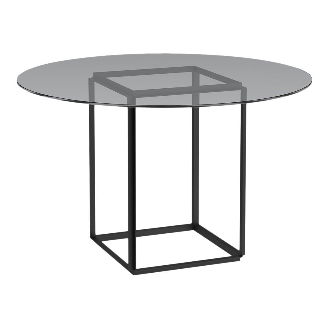 Round glass tabletop with a sleek black geometric base, showcasing modern style and minimalistic design.