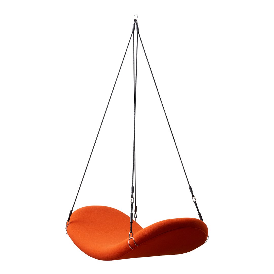 Vibrant orange hanging chair with smooth, curvy silhouette and sleek black suspension straps. Perfect for modern decor.