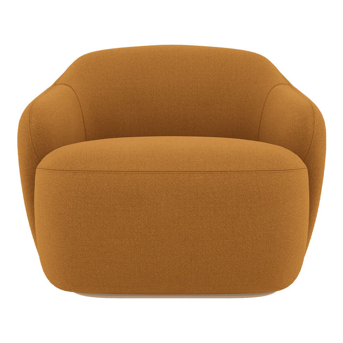 "Cozy armchair in warm mustard yellow with a soft, smooth upholstery and rounded, modern silhouette."