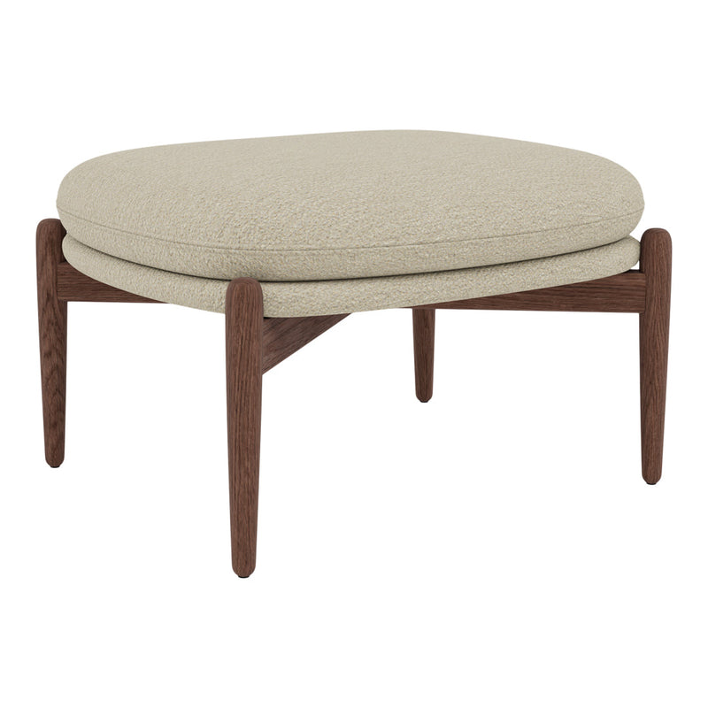 Beige upholstered ottoman with a rounded design and dark wooden legs, showcasing a modern and minimalist aesthetic.