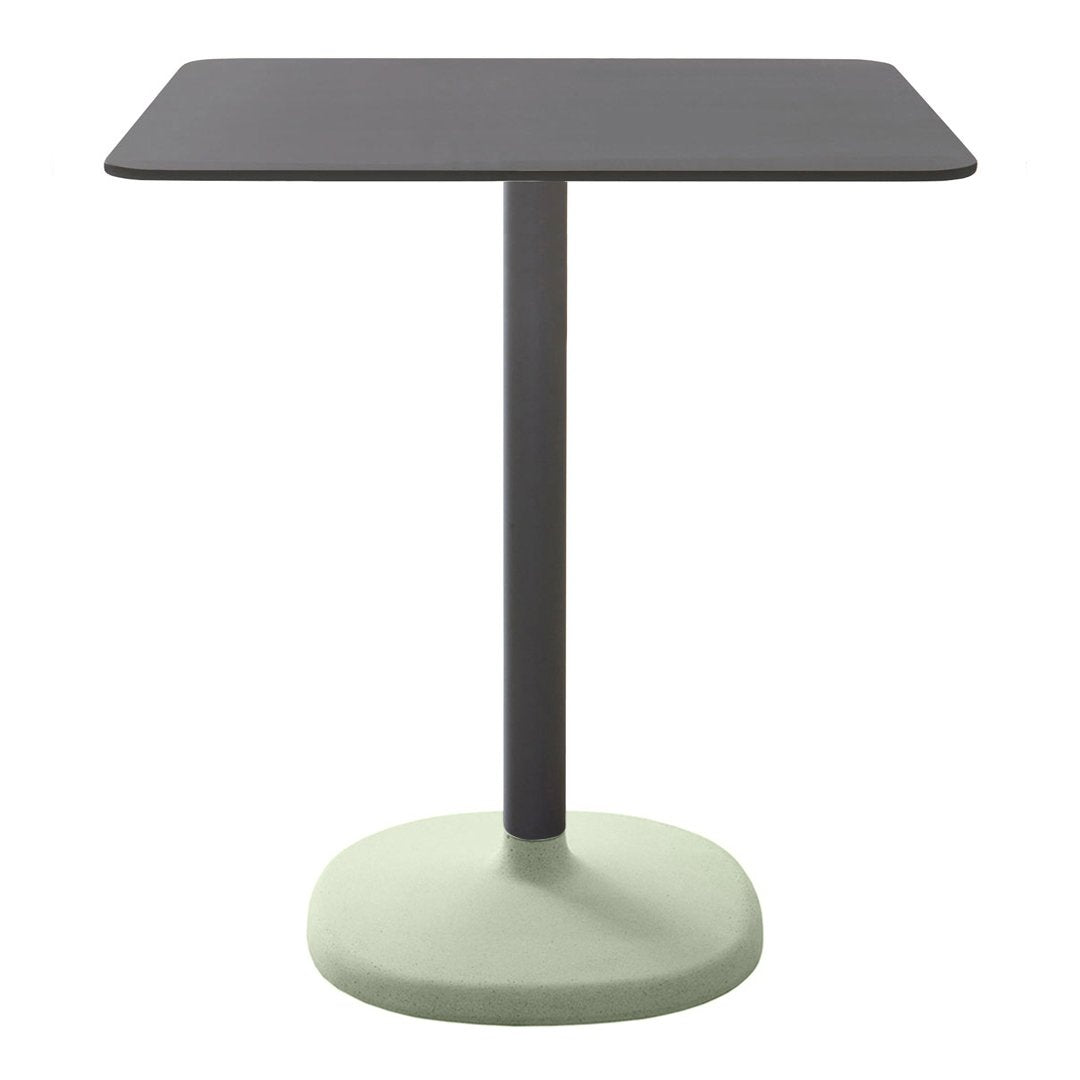 Square table featuring a dark gray top and a soft green base, ideal for modern decor.
