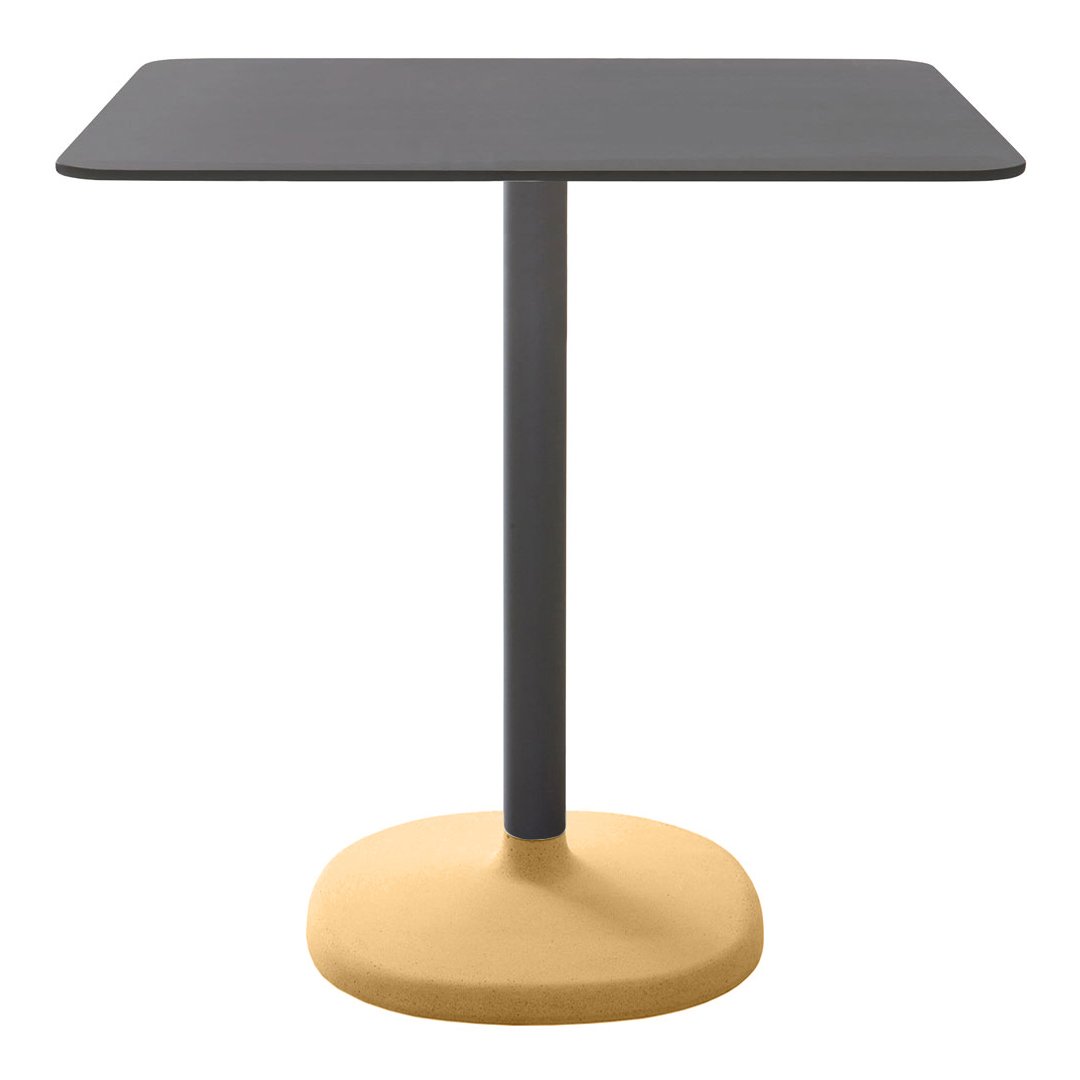 Modern table featuring a sleek black top and a round yellow base, perfect for contemporary spaces.