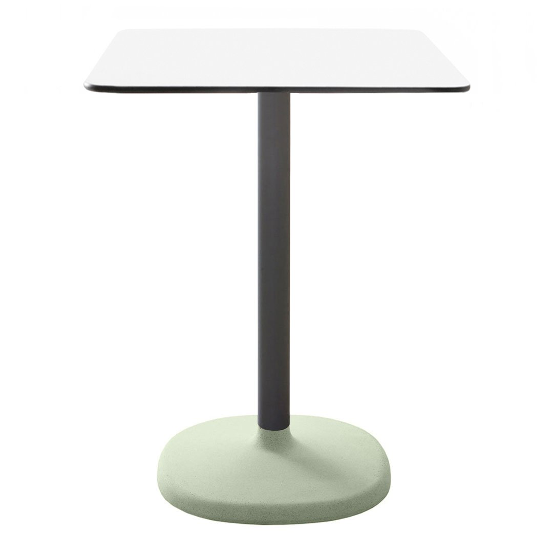 Modern square table with a white top, gray stem, and soft green base for a stylish touch.