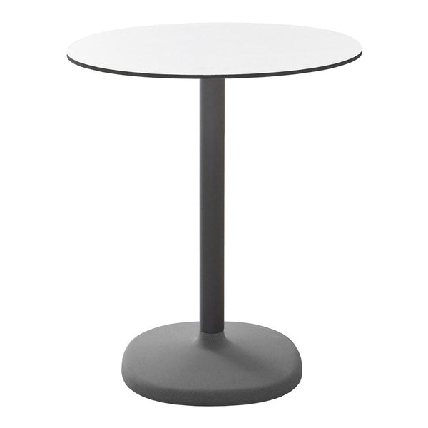 Modern round table with a sleek white tabletop and a gray pedestal base, showcasing a minimalist design.