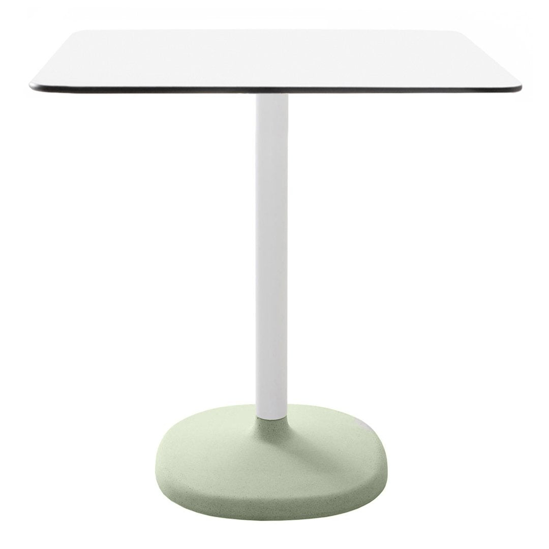 Square white tabletop with a thin black edge, supported by a sleek white column atop a pastel green base.