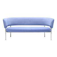 Modern curved sofa in soft light blue fabric with sleek chrome legs. Perfect for contemporary living spaces.