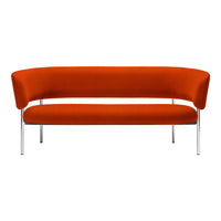 Stylish orange velvet sofa with a clean, curved design and sleek chrome legs, perfect for modern interiors.