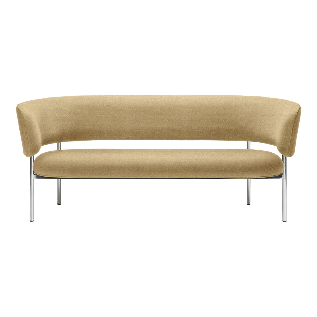 Curved sofa in soft beige upholstery with sleek chrome legs, showcasing a minimalist design. Perfect for modern decor.