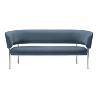 Sleek curved blue sofa with a smooth fabric finish and shiny chrome legs, ideal for modern living spaces.