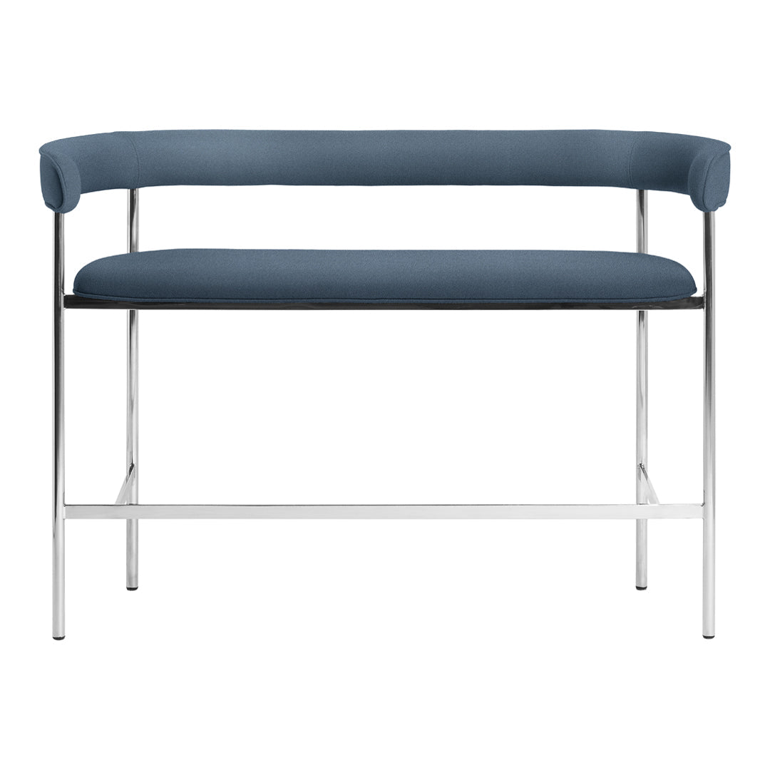 Modern blue upholstered bench with sleek chrome frame, minimalistic design, and smooth, rounded edges.
