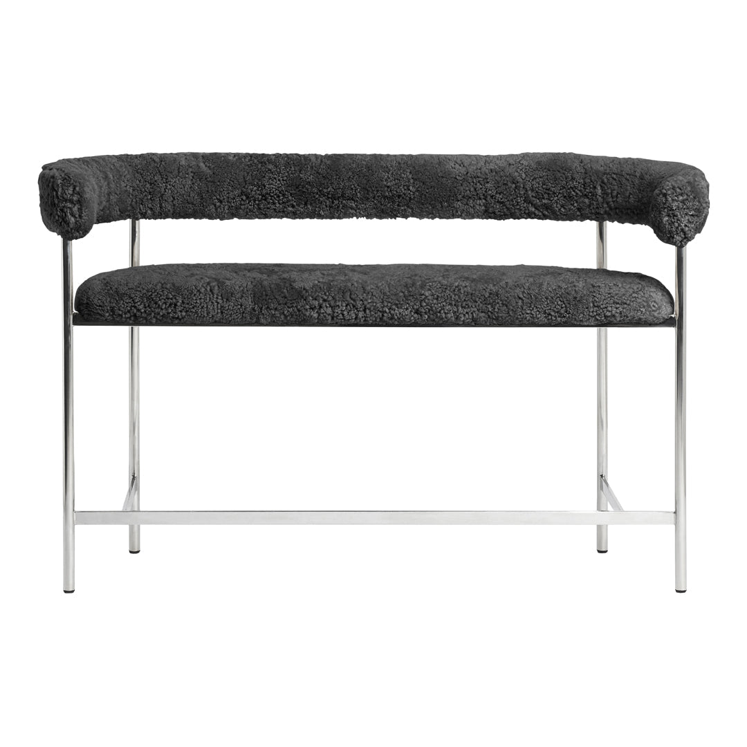 Gray textured upholstery bench with chrome frame, featuring plush, rounded arms and a minimalist design.