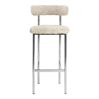 Cream faux shearling bar stool with sleek chrome legs and modern, minimalist design.