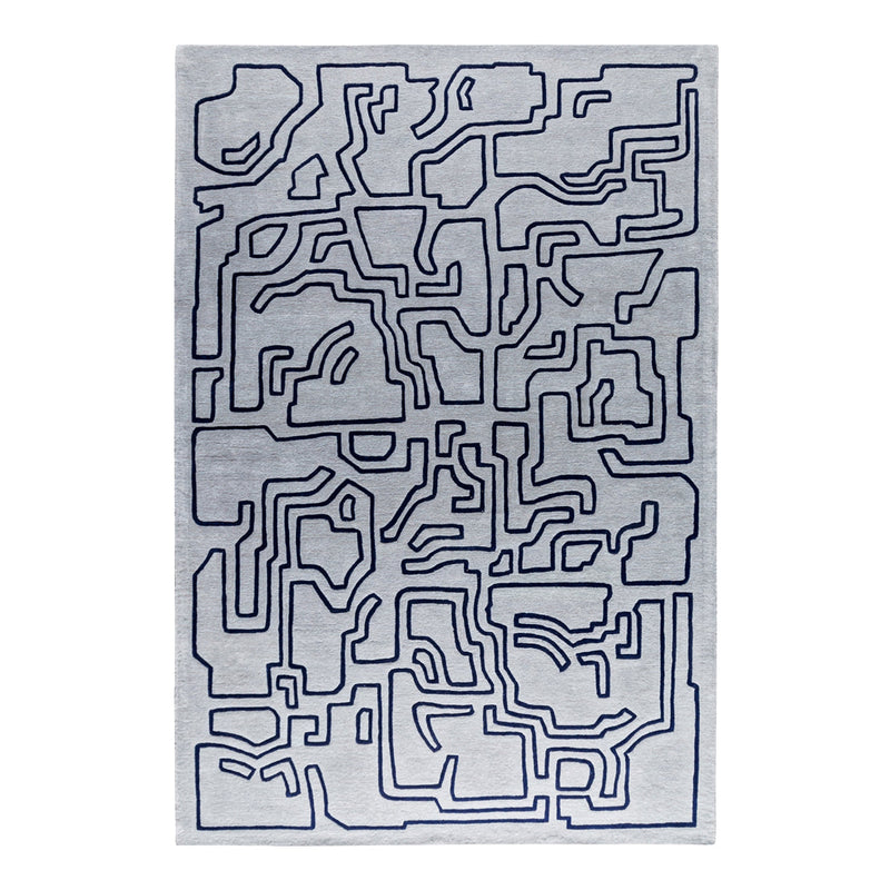 Abstract gray rug with navy blue geometric lines creating a contemporary maze pattern. Ideal for modern decor.