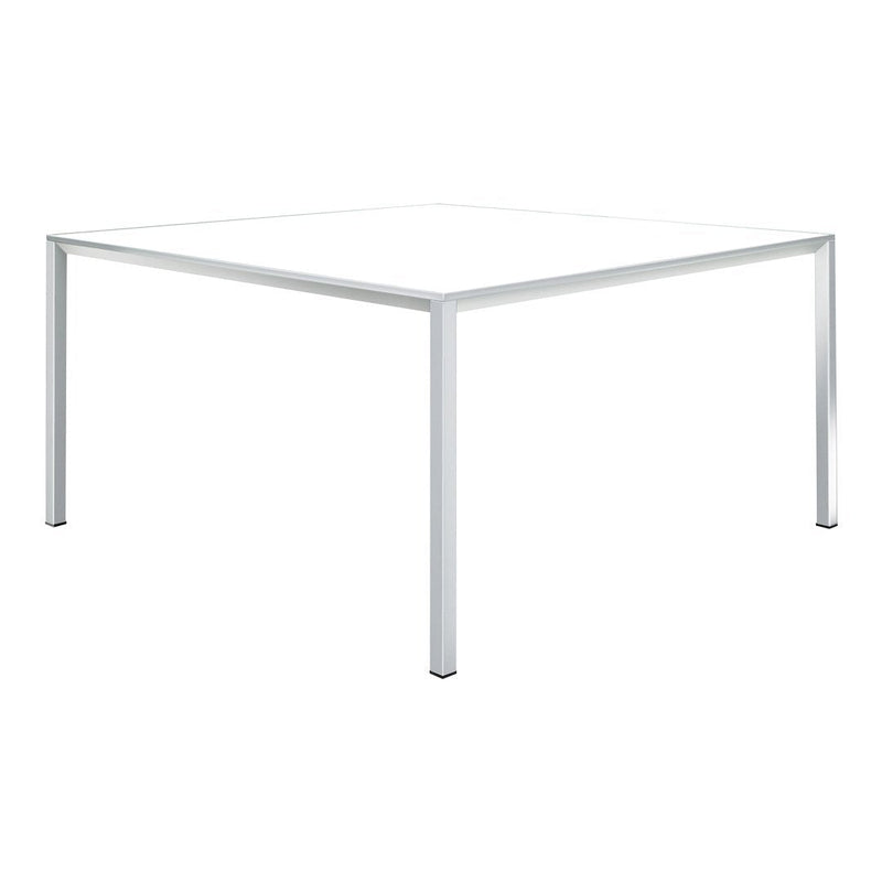 White square table with minimalist design and sleek silver legs, perfect for modern decor.