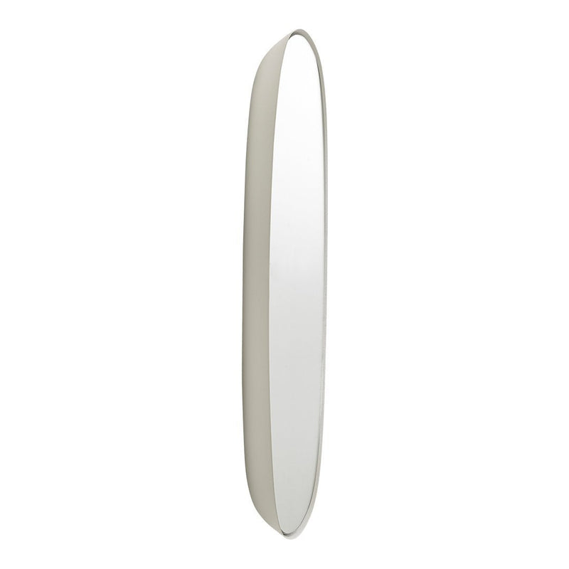 Tall, oval mirror with a smooth, neutral-toned frame in soft beige, perfect for modern decor.