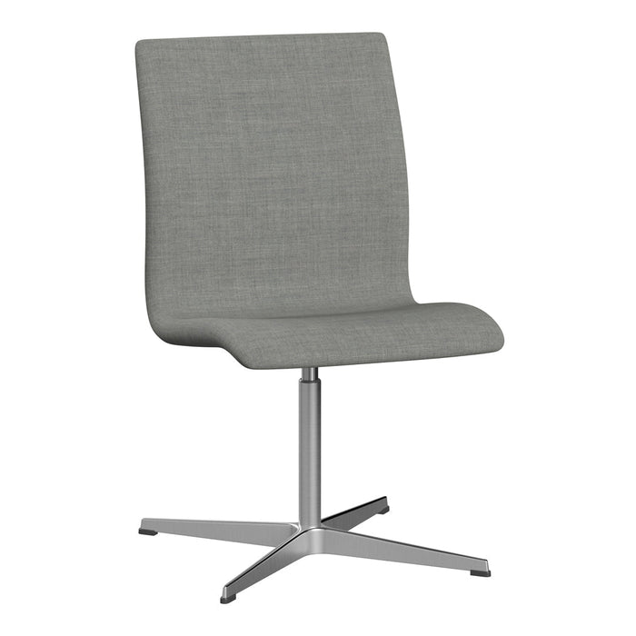 Gray upholstered chair with a smooth, minimalist design and metallic base, perfect for modern interiors.