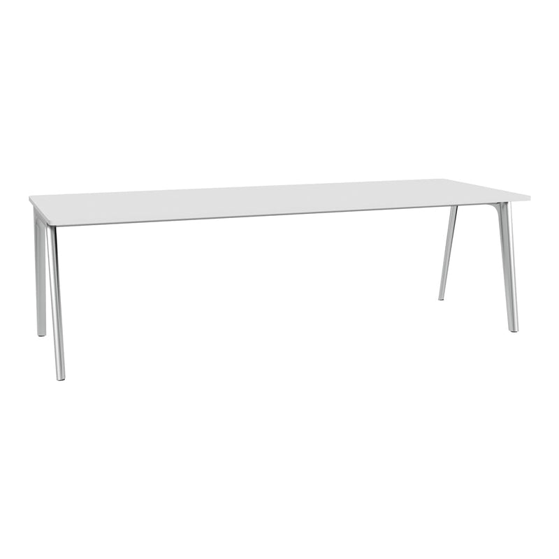 White rectangular table with sleek, minimalist design and silver metal legs. Perfect for modern decor.