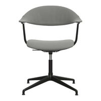 Gray upholstered chair with a minimalist design, featuring a black metal base for a modern aesthetic.
