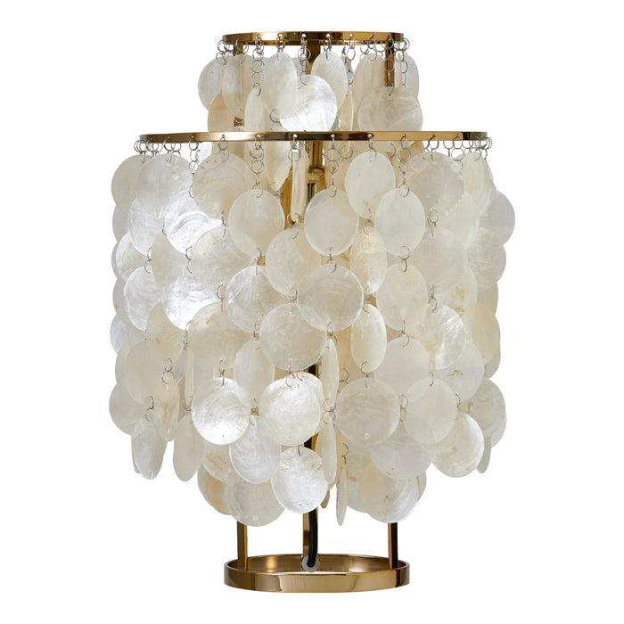 Elegant white shell lamp with a layered, circular pattern and gold accents for a chic coastal ambiance.