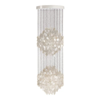 Elegant white chandelier with crystal strands and geometric cluster patterns, ideal for modern decor.
