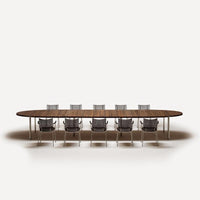Elegant oval wooden dining table with a rich brown finish and six clear acrylic chairs, set on a minimalist white background.