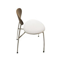 Modern chair with a white seat, natural wood back, and sleek metal legs, showcasing a minimalist design.