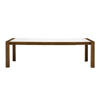 Rectangular dining table featuring a white top and rich brown wooden legs, showcasing a modern, minimalist design.