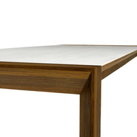 Light gray tabletop with a smooth finish, framed by rich brown wood edges, showcasing modern minimalism.