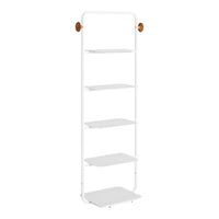 White metal shelving unit with sleek, modern design and warm wooden accents. Features five spacious, open shelves.